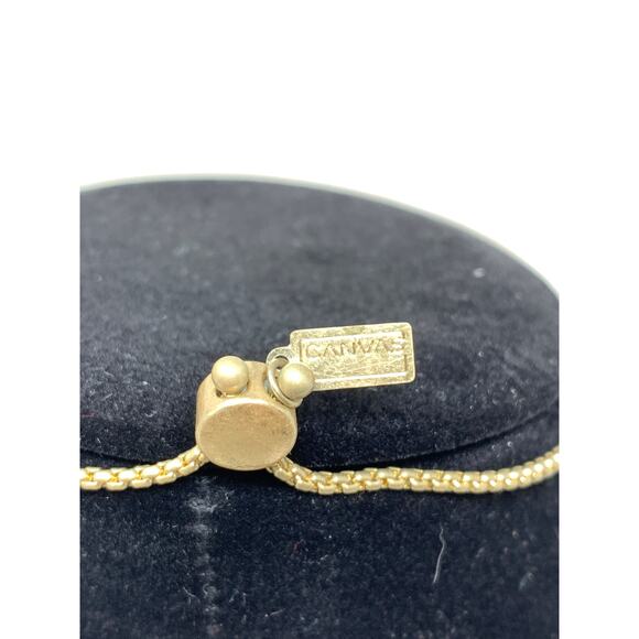 Canvas Feather Cut Out Gold Tone Metal Bracelet Adjustable - Picture 4 of 6